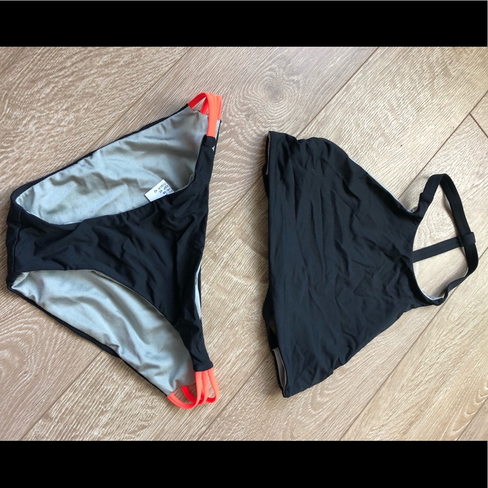 Reversible black orange grey sports like bikini